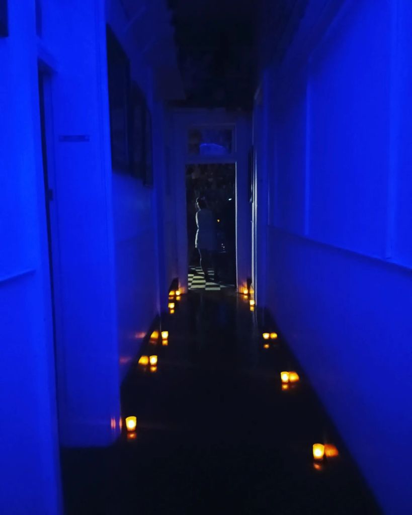 Candles illuminated the hallway. The night was dark and stormy. I was in my element! 