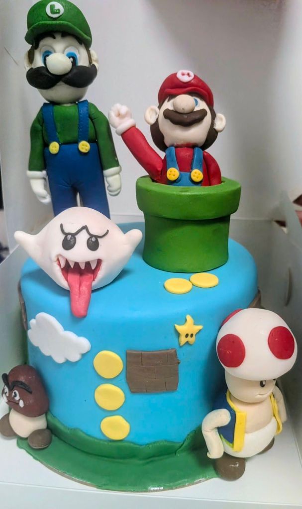 Abigail’s beautiful Super Mario cake was made from ‘Up To You Cakes’ here in QLD. You can find her on Facebook.